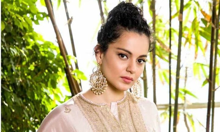 Kangana charms us with her spellbinding guise embellished with ethnic jhumkas; captured at the inauguration of her New Studio today!