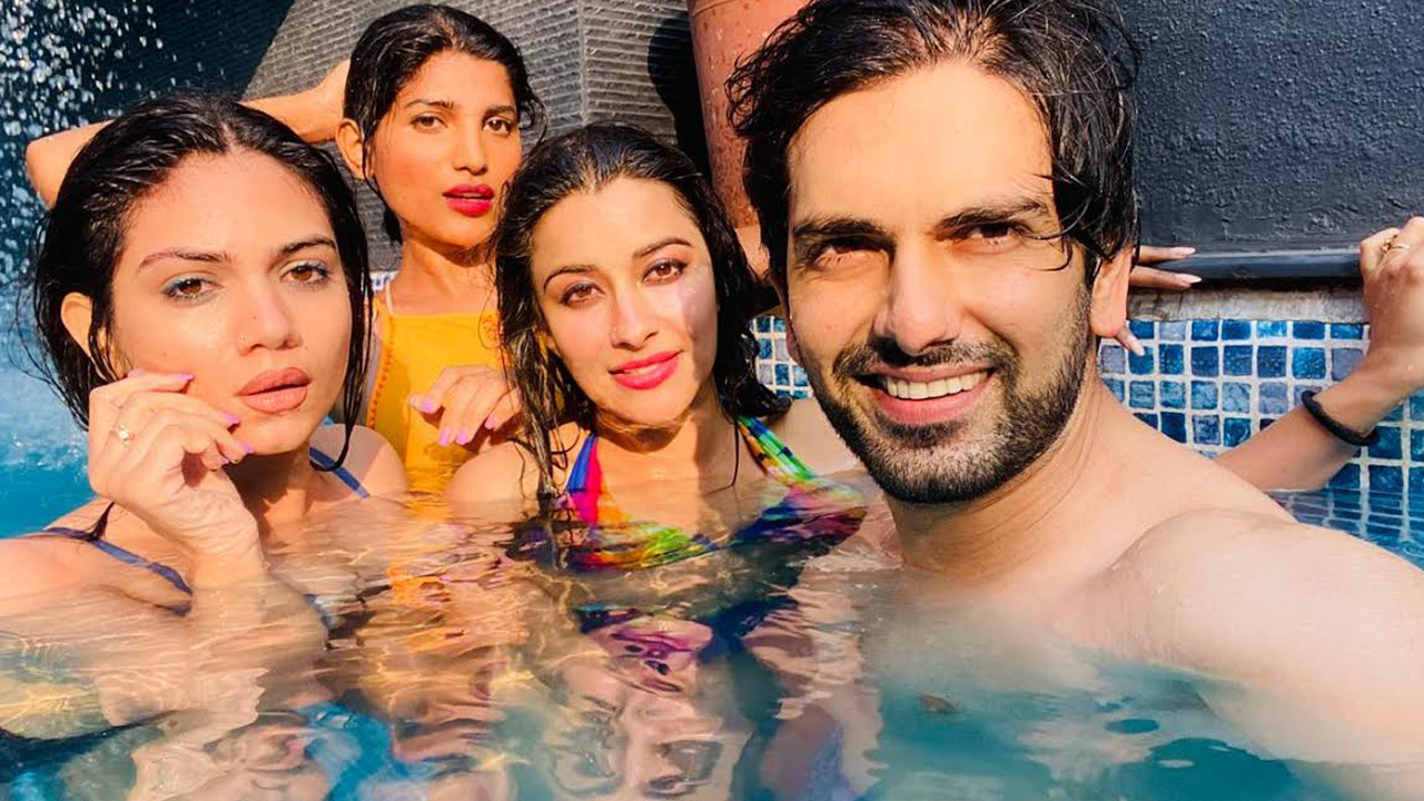 Nyra and Rahul drives the heat away by a dip in the pool!