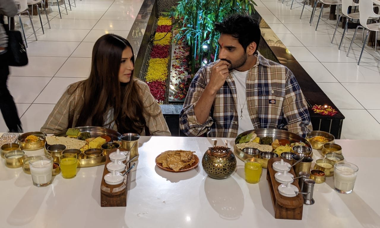 During the promotions in Ahmedabad, ‘Tadap’ lead pair Ahan Shetty and Tara Sutaria gorged onto delicious Gujarati thali!