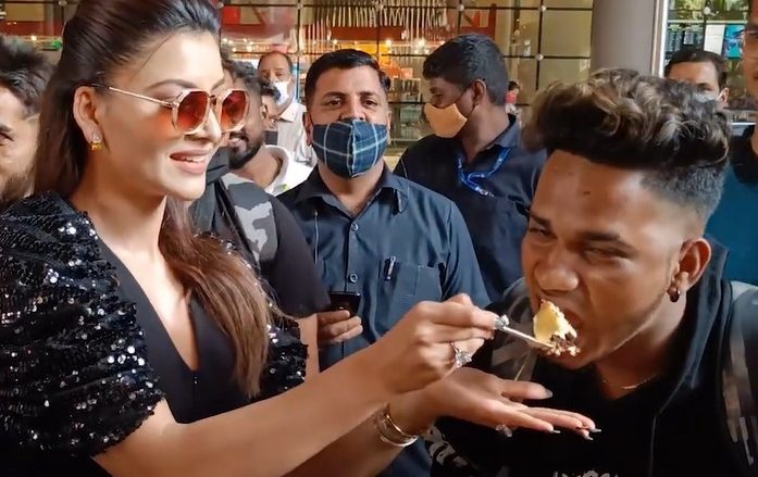On return from Maldives, Urvashi Rautela cut the cake and feed all her paparazzi friends!